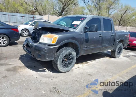 2012 Nissan Titan Pro-4X z USA, uszkodzony, nr VIN 1N6BA0EC7CN304116